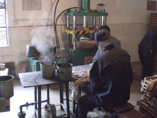 pu-erh-factory-press